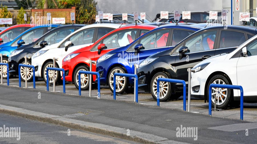 Cars on a UK dealership forecourt available on PCP and HP finance