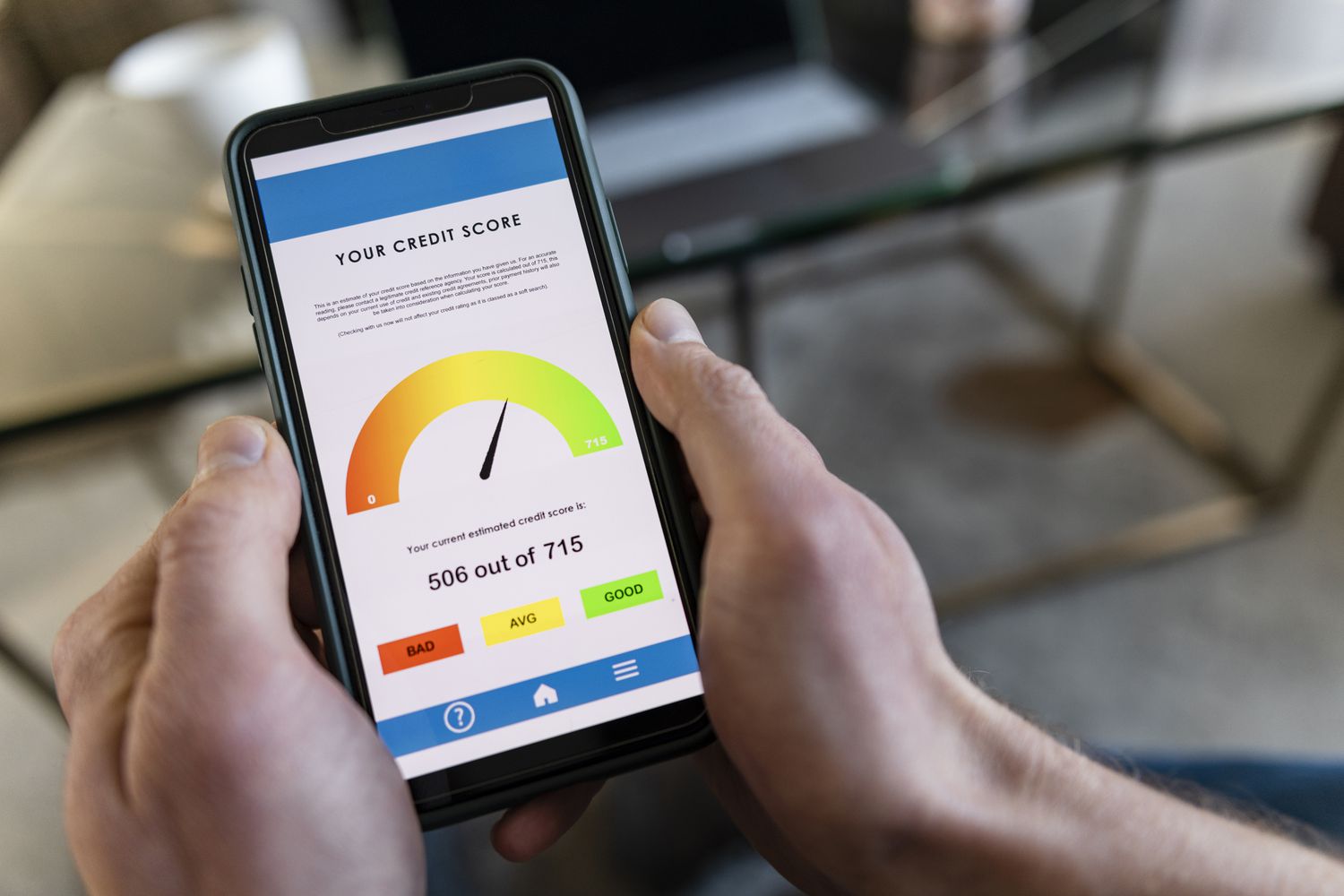 Credit score app showing a score improvement after errors were corrected
