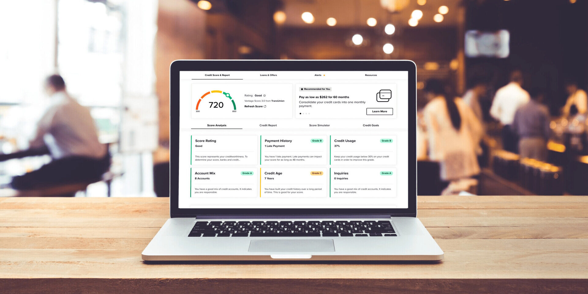A laptop displaying a comprehensive credit score dashboard
