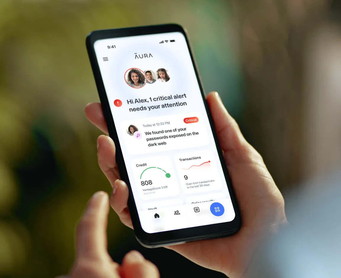 Smartphone displaying a critical alert from a credit monitoring service